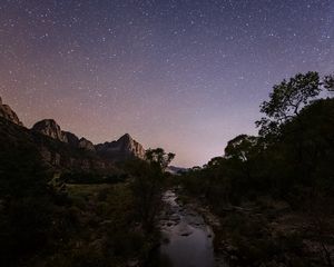 Preview wallpaper rocks, trees, river, stars, sky, night, landscape