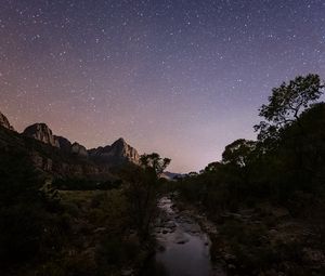 Preview wallpaper rocks, trees, river, stars, sky, night, landscape