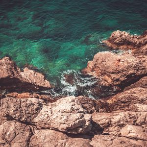 Preview wallpaper rocks, water, aerial view, coast, sea