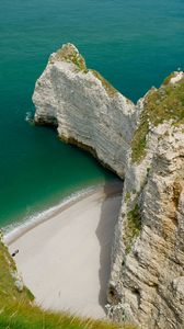 Preview wallpaper rocks, water, beach, grass, nature