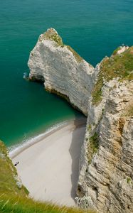 Preview wallpaper rocks, water, beach, grass, nature