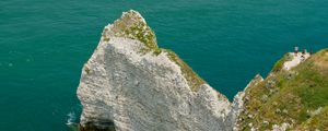 Preview wallpaper rocks, water, beach, grass, nature