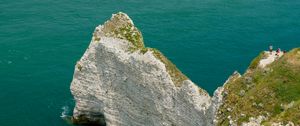 Preview wallpaper rocks, water, beach, grass, nature