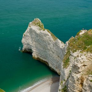 Preview wallpaper rocks, water, beach, grass, nature