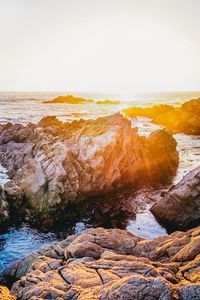 Preview wallpaper rocks, water, sea, sun