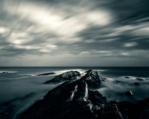 Preview wallpaper rocks, water, sky, gloomy, dark