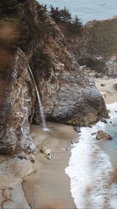 Preview wallpaper rocks, waterfall, sea, coast, beach