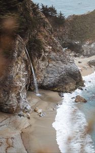 Preview wallpaper rocks, waterfall, sea, coast, beach