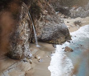 Preview wallpaper rocks, waterfall, sea, coast, beach