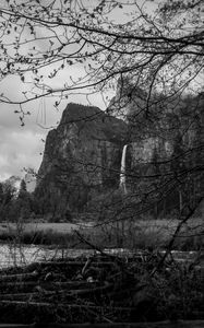 Preview wallpaper rocks, waterfall, trees, branches, pond, black and white