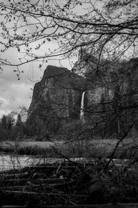 Preview wallpaper rocks, waterfall, trees, branches, pond, black and white