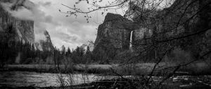 Preview wallpaper rocks, waterfall, trees, branches, pond, black and white