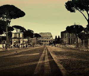 Preview wallpaper rome, italy, colosseum, city, street, people, road, trees