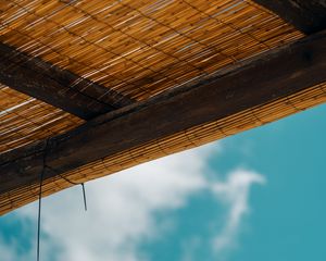 Preview wallpaper roof, bamboo, rope, sky