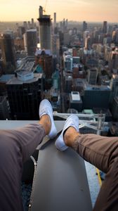 Preview wallpaper roof, city, aerial view, legs, overview