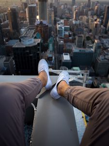 Preview wallpaper roof, city, aerial view, legs, overview