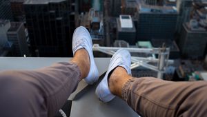 Preview wallpaper roof, city, aerial view, legs, overview