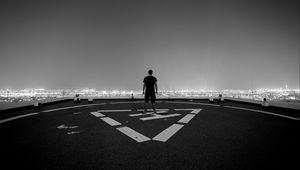 Preview wallpaper roof, loneliness, bw, man, night city, top view