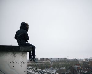 Preview wallpaper roof, man, loneliness, freedom