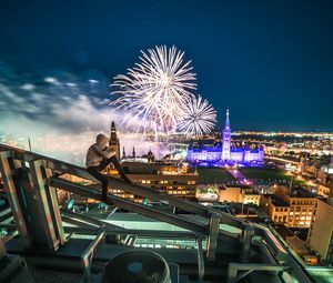 Preview wallpaper roof, night city, aerial view, silhouette, fireworks, overview