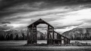 Preview wallpaper roof, wooden, building, sky, bw