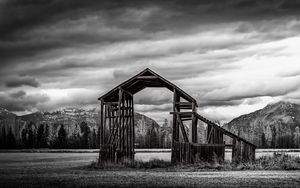 Preview wallpaper roof, wooden, building, sky, bw