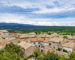 Preview wallpaper roofs, houses, trees, hills