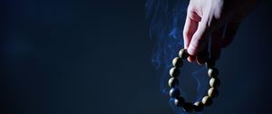 Preview wallpaper rosary, hand, smoke