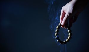 Preview wallpaper rosary, hand, smoke