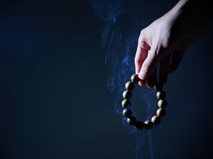 Preview wallpaper rosary, hand, smoke