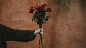 Preview wallpaper roses, bouquet, hand, wall