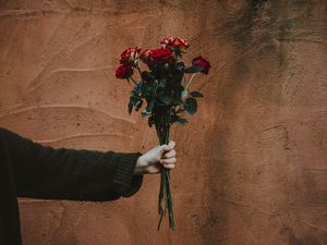 Preview wallpaper roses, bouquet, hand, wall