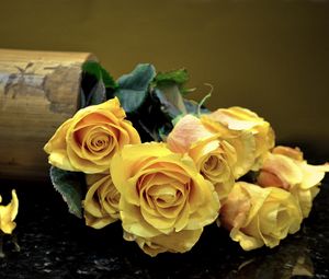 Preview wallpaper roses, flowers, vase, surface, leaves, yellow