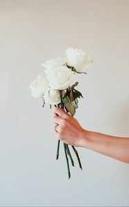 Preview wallpaper roses, white, bouquet, flowers, hand