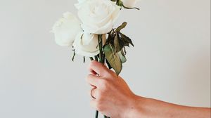 Preview wallpaper roses, white, bouquet, flowers, hand