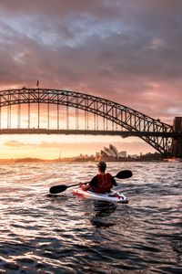 Preview wallpaper rowing, helmet, bridge