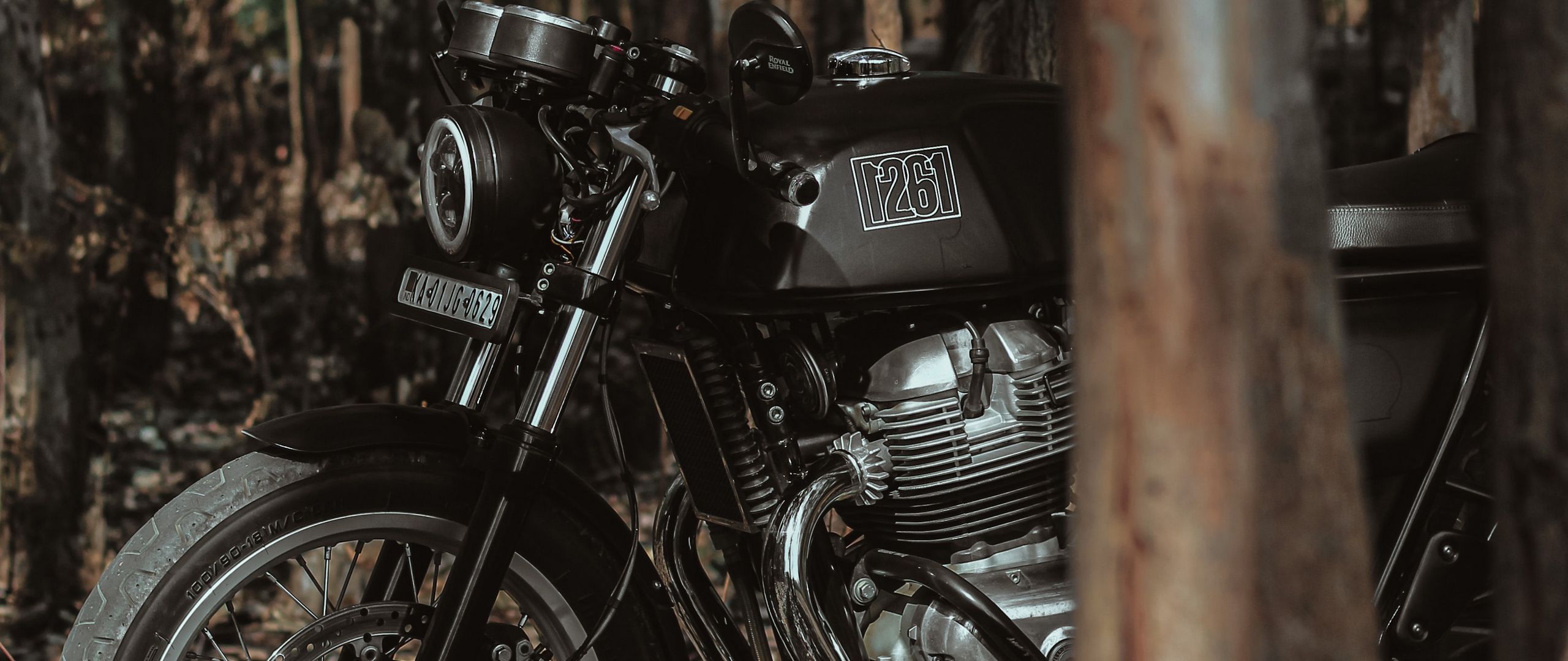 2560x1080 Wallpaper royal enfield, motorcycle, bike, black, forest