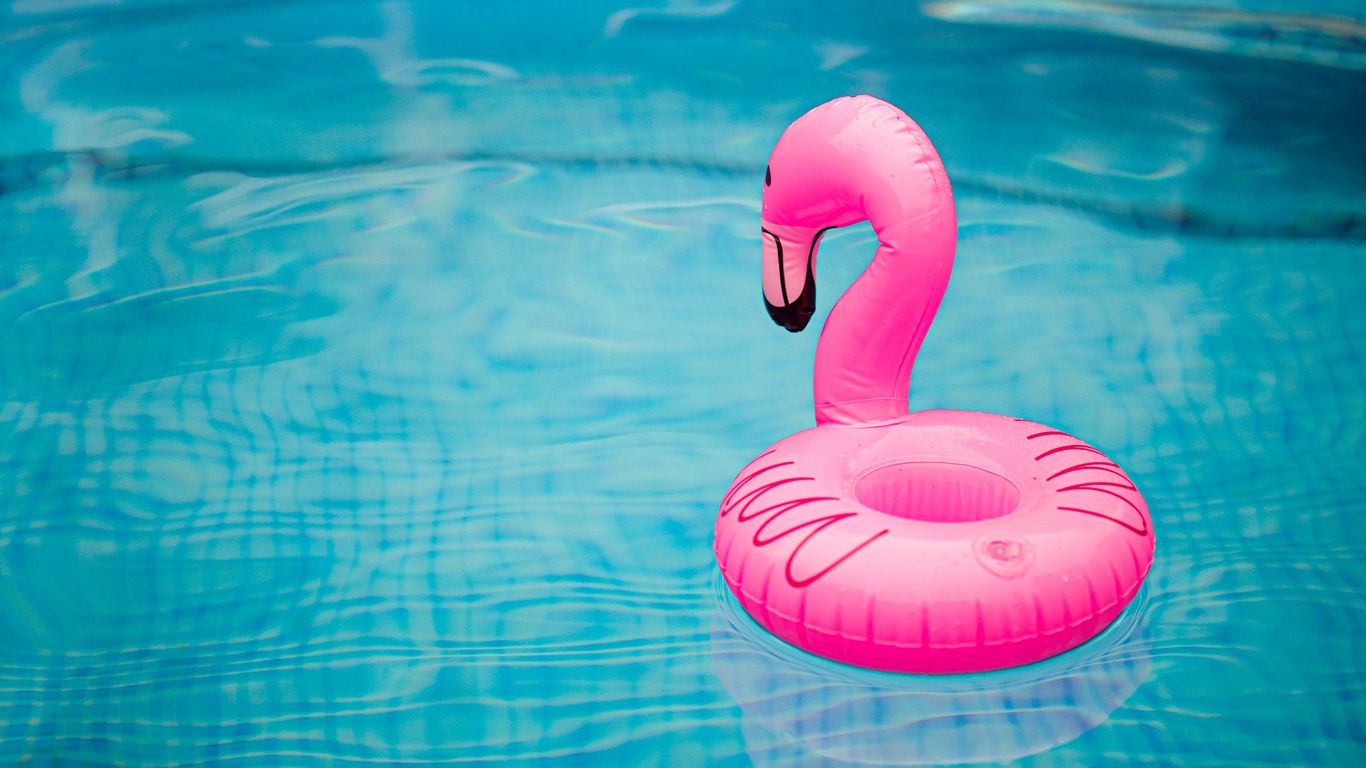 Download wallpaper 1366x768 rubber ring, flamingo, pool, water, waves  tablet, laptop hd background