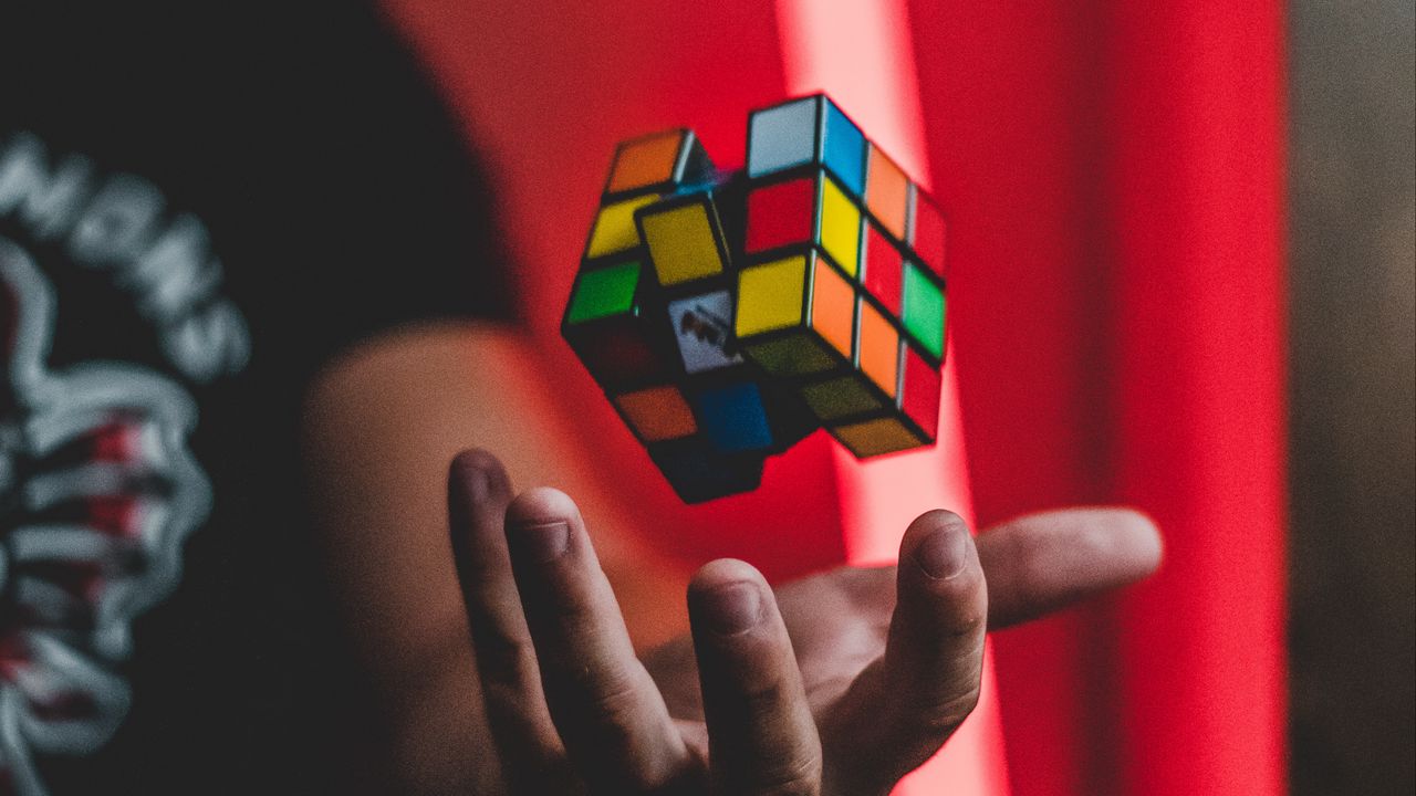 Wallpaper rubiks cube, hand, levitation, colorful