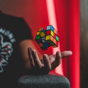 Preview wallpaper rubiks cube, hand, levitation, colorful