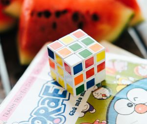 Preview wallpaper rubiks cube, puzzle, book, light