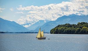 Preview wallpaper sailboat, boat, sea, hills, sky