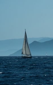 Preview wallpaper sailboat, boat, water, sea, mountains, landscape