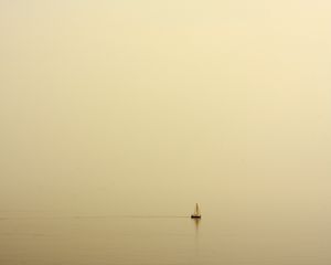 Preview wallpaper sailboat, sea, fog, uniform, lonely, haze