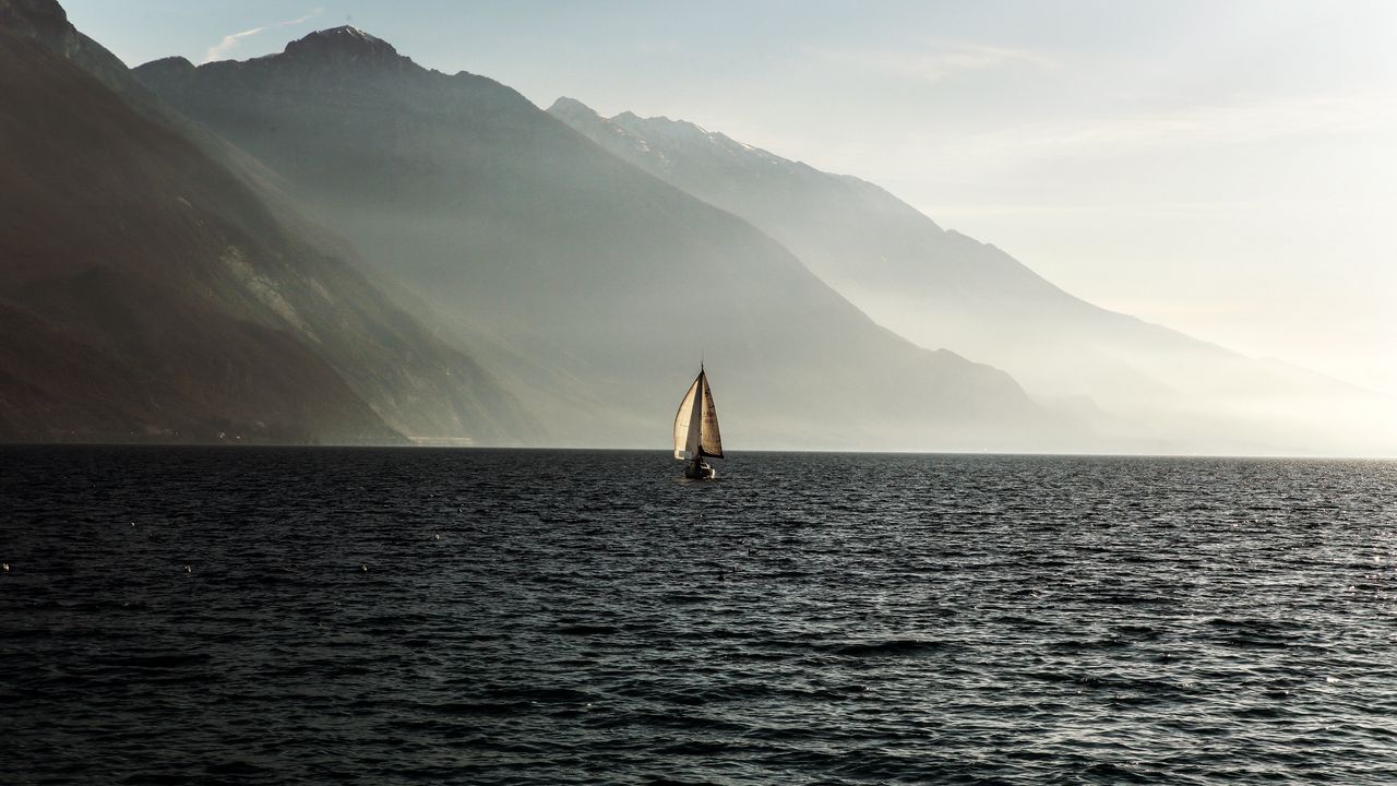 Wallpaper sailboat, sea, mountains, fog, waves