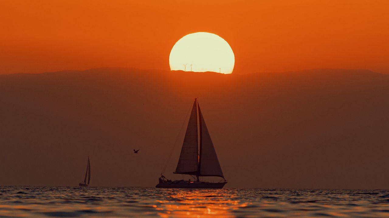 Wallpaper sailboat, sun, glare, sea, sunset