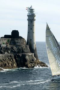 Preview wallpaper sailing vessel, rock, beacon, sea, excursion, tourists