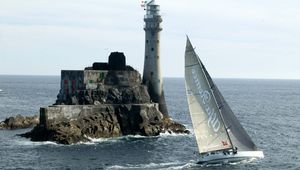 Preview wallpaper sailing vessel, rock, beacon, sea, excursion, tourists