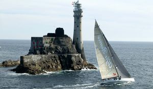 Preview wallpaper sailing vessel, rock, beacon, sea, excursion, tourists