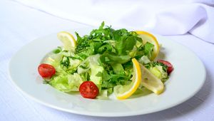 Preview wallpaper salad, lemon, cherry tomatoes, fresh herbs